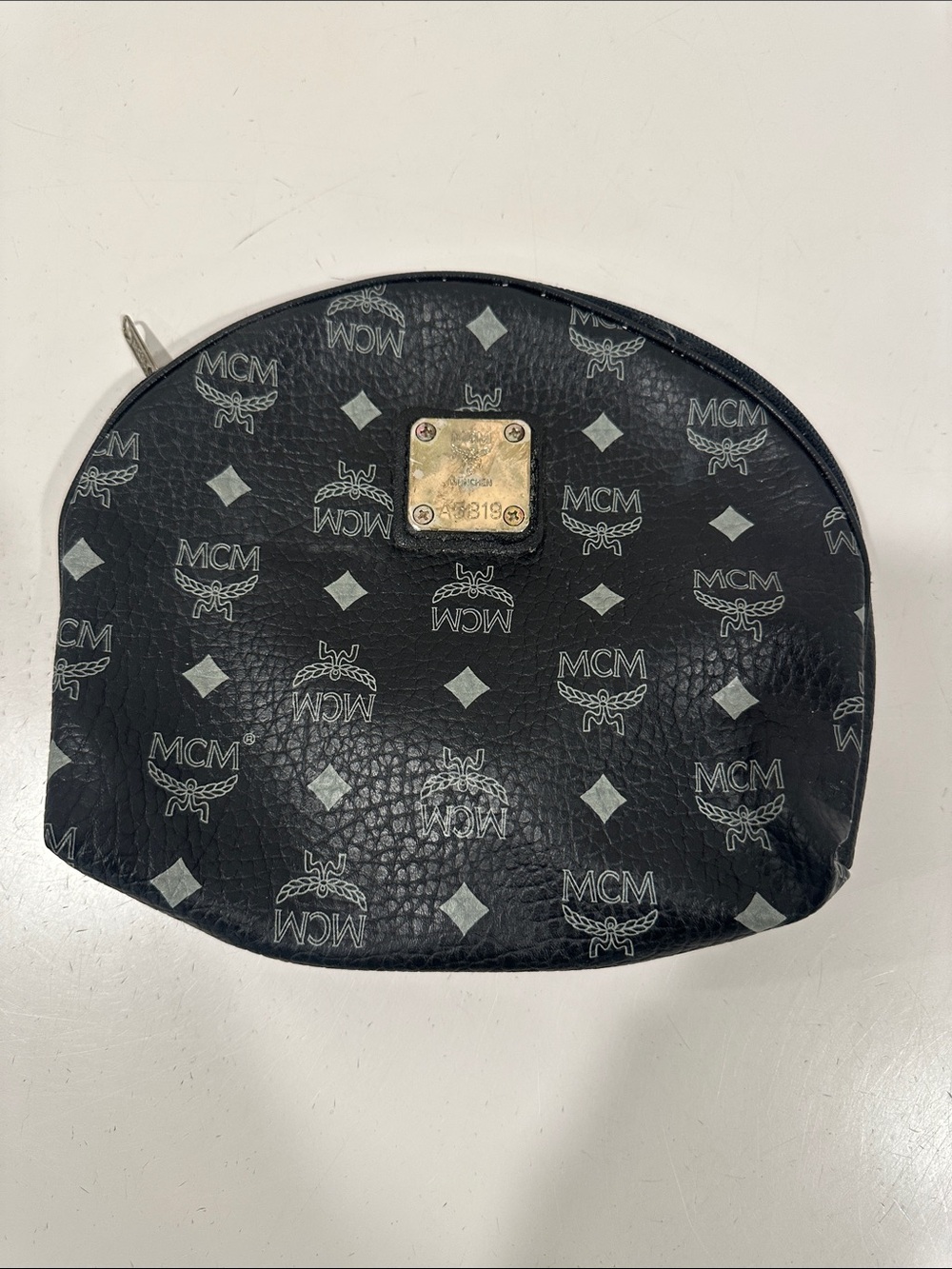 MCM Black Logo Zip Cosmetic Case with Gold Plaque